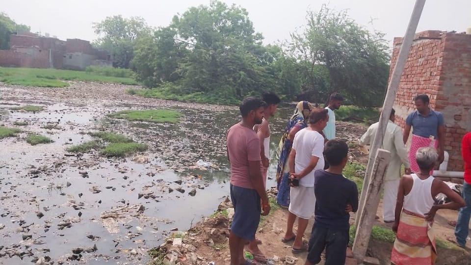 Child dies by drowning in a pond