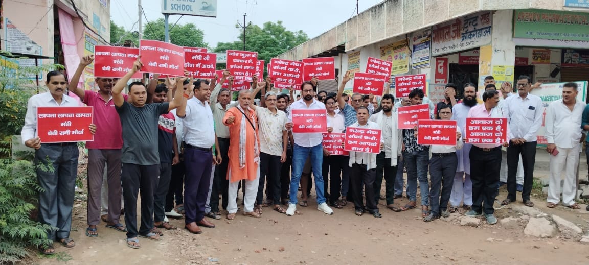 Public anger erupted over the broken road posters of the missing minister were waved