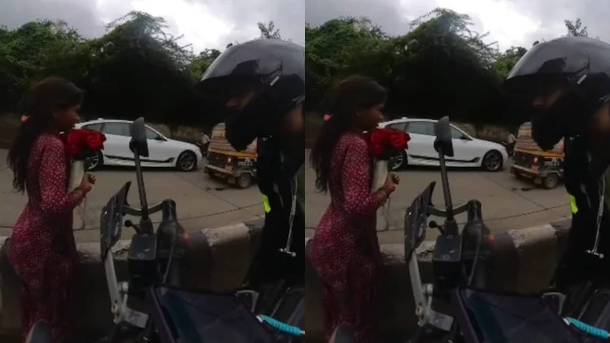 Auto driver slapped a girl selling roses on the roadside people got angry seeing the crying girl Video Viral