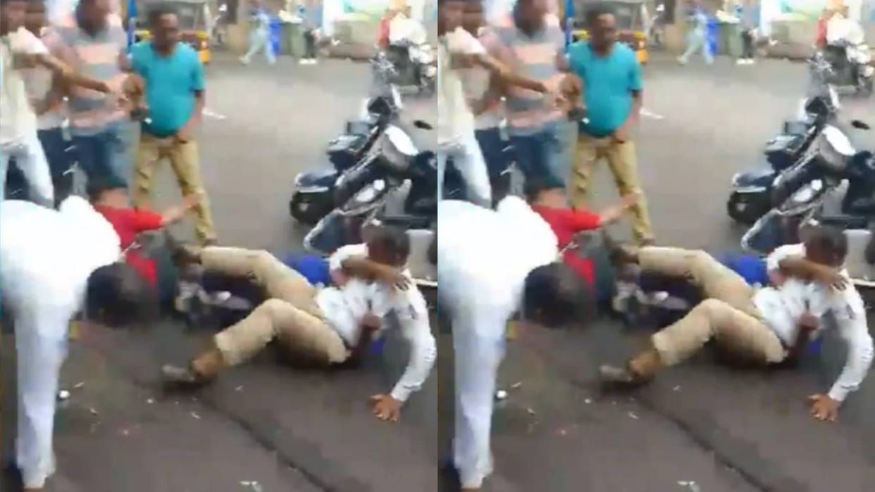 When the police asked for the license, the boy got furious called his father and then beat up the police badly