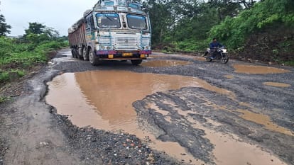 Kursa river water flowing over the bridge officials are not interested in filling the potholes in Balrampur Ra