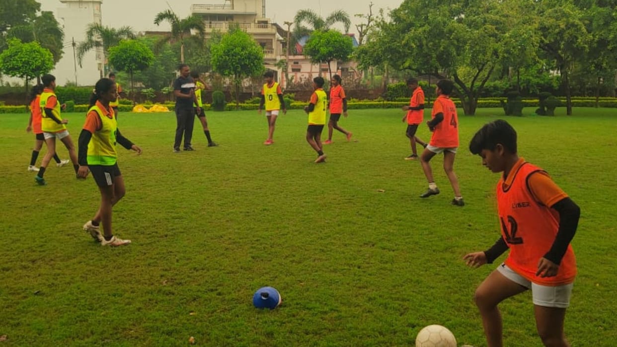 Sports news updates including Daughters of Kashi sweating for football competition in varanasi