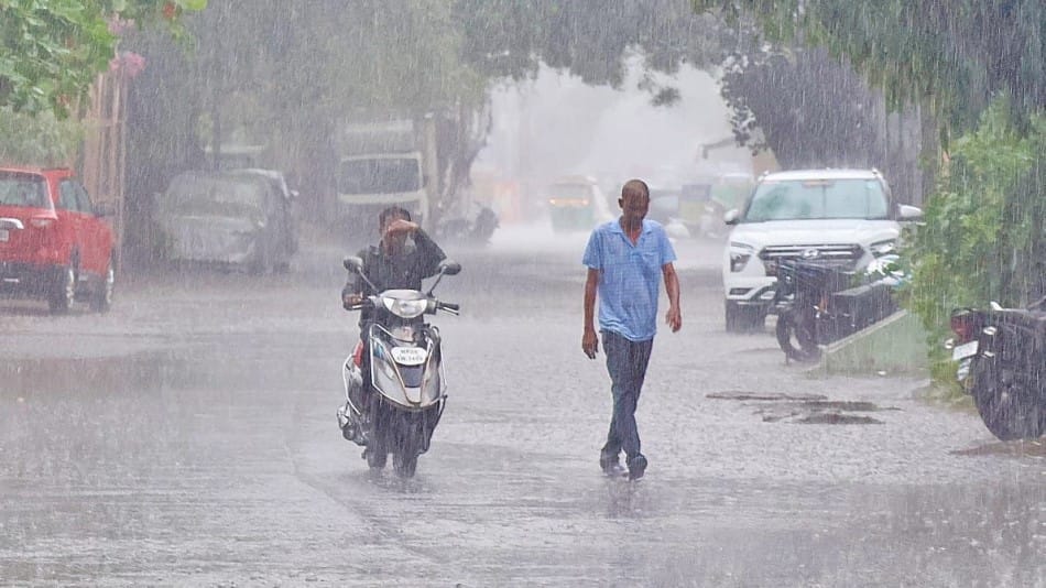 indore news: heavy rainfall brings relief, temperature drops in city