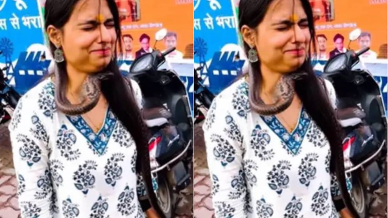 A girl was making a video with a black snake around her neck you wont believe Video goes Viral on Internet