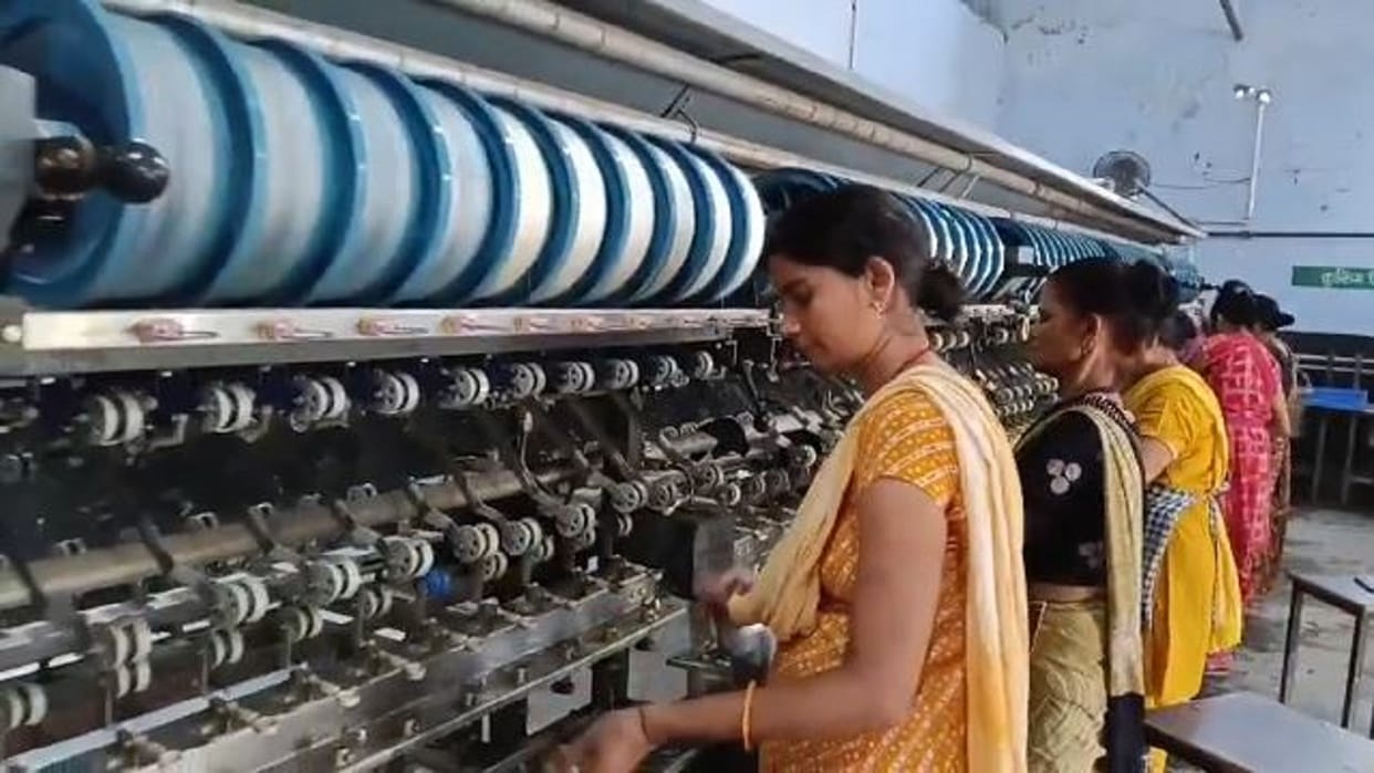 Women earning money by making silk thread in Pilibhit