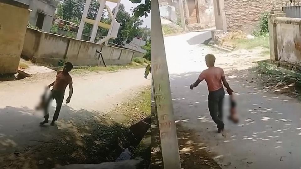 Video Of A Father Parading His 8-month-old Son Around Village Hanging Him  Upside Down Goes Viral - Amar Ujala Hindi News Live - रोता रहा बच्चा,  तमाशबीन बने लोग:आठ माह के बेटे