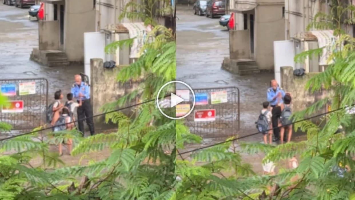 elderly security guard greet school kids in his own way viral video melts netizens heart