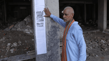 Notices pasted on buildings built on the land of Maharishi Ashram