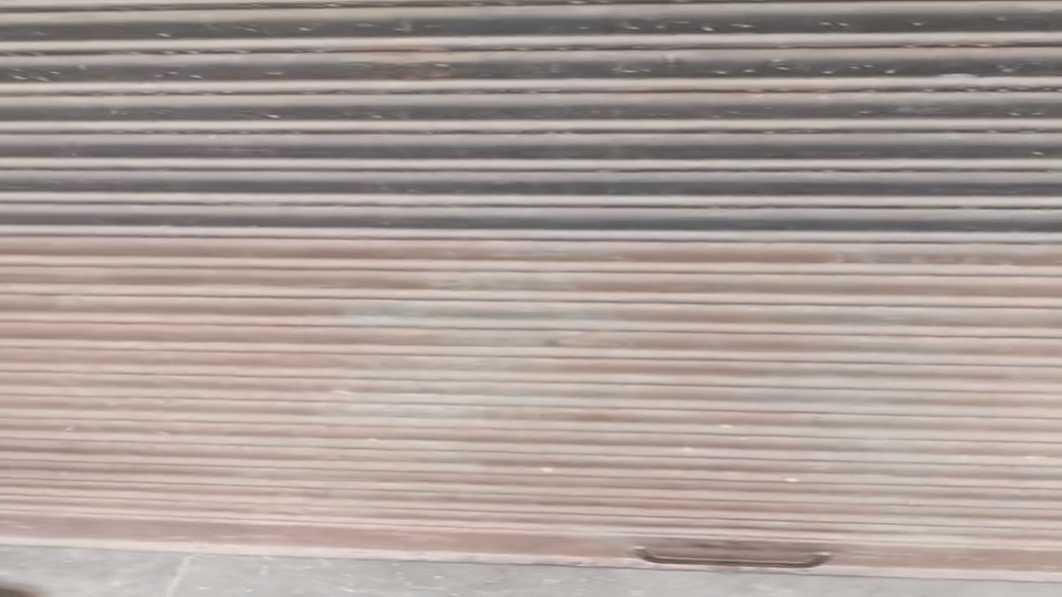 A boy and a girl were found in an objectionable situation inside a shop