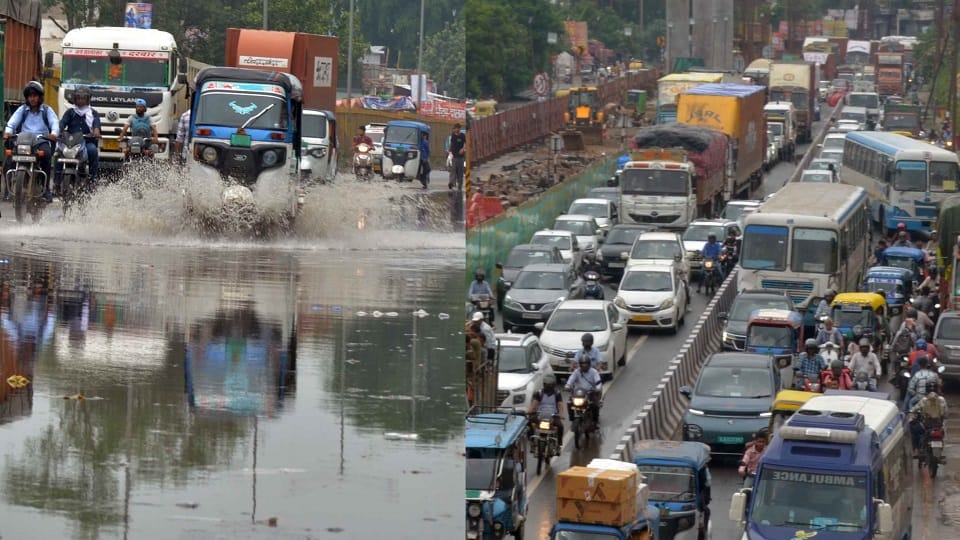 Agra-Delhi highway Road lost in rain vehicles stuck for hours 5 km long queue