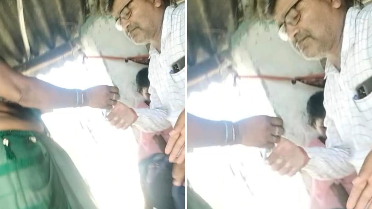 Video of taking bribe for PM awas yojana goes viral in Azamgarh officer threatens to strike off name