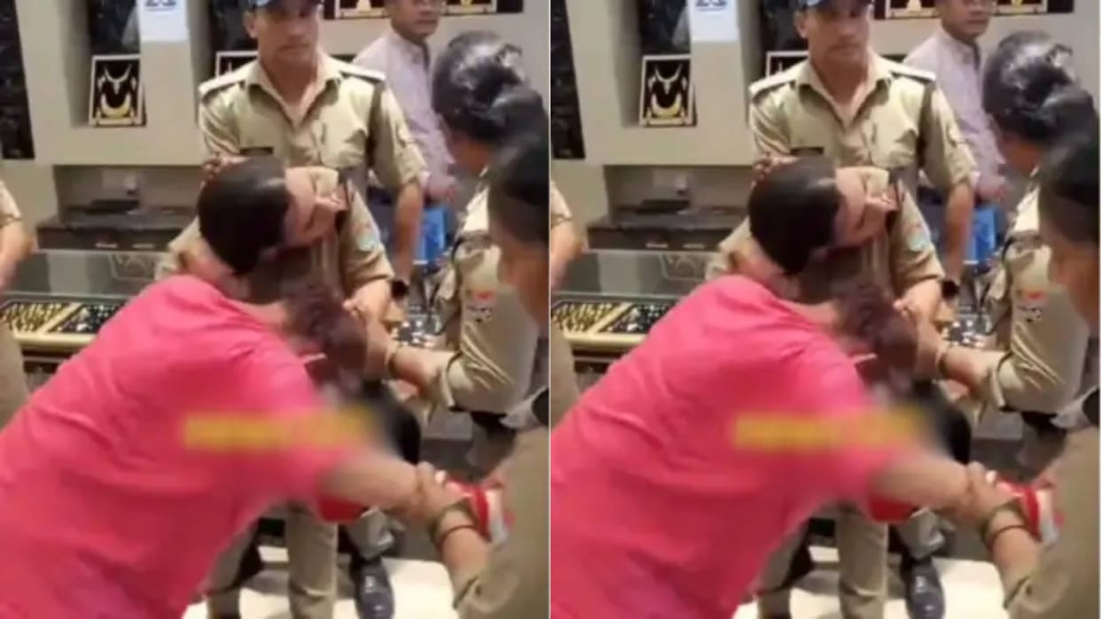 A woman was stealing from a jewellery shop without any noise the police caught her she started creating drama