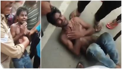 The merciless act of the dreaded crowd: Kick-punched in front of the police in front of the police, due to this, he was beaten on the road Mob Caught the suspect and beat Him up after throwing Him on the road