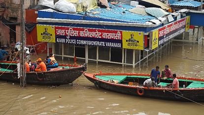 UP Flood News Temples Submerged Rajghat-Namo Ghat Route Closed as Ganga Water Level Rises see photos