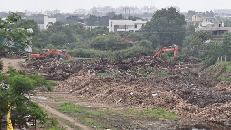 indore news city forest turns into dumping ground, residents suffer from toxic air and water
