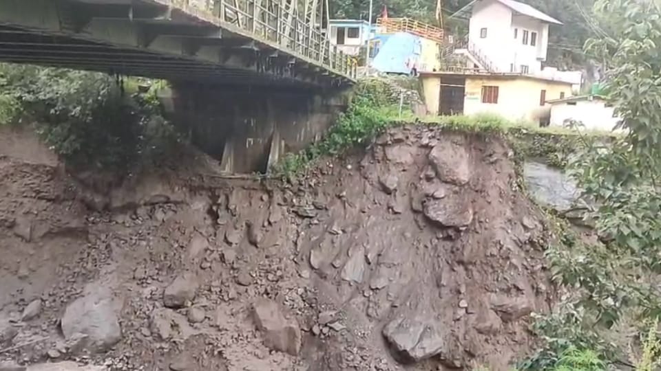 Badrinath Highway After heavy rains safety wall under bridge near Hanuman Chatti was washed away