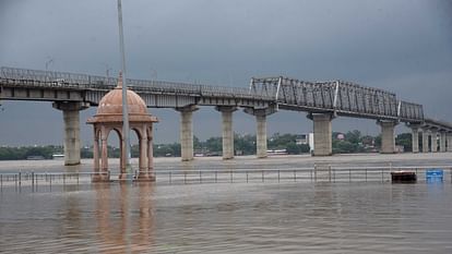 UP Flood News Temples Submerged Rajghat-Namo Ghat Route Closed as Ganga Water Level Rises see photos