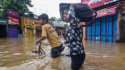 UP Floods Ganga flows 12 steps below Vishwanath temple gate Namo Ghat remained closed for third day as well