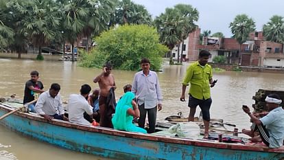 UP Flood News Temples Submerged Rajghat-Namo Ghat Route Closed as Ganga Water Level Rises see photos