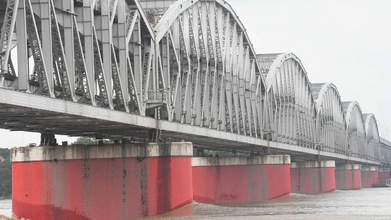 UP Flood News Temples Submerged Rajghat-Namo Ghat Route Closed as Ganga Water Level Rises see photos