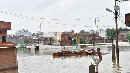 UP Flood News Temples Submerged Rajghat-Namo Ghat Route Closed as Ganga Water Level Rises see photos