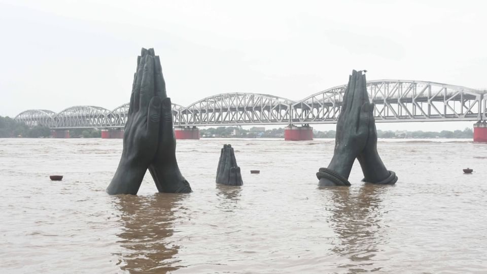 UP Flood News Temples Submerged Rajghat-Namo Ghat Route Closed as Ganga Water Level Rises see photos