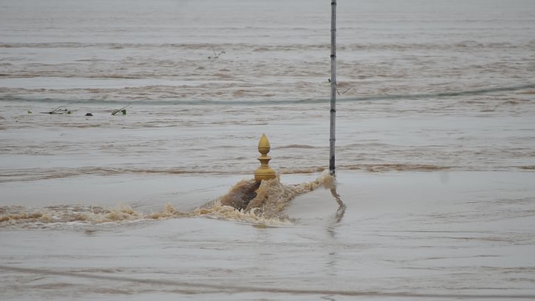UP Floods Ganga flows 12 steps below Vishwanath temple gate Namo Ghat remained closed for third day as well