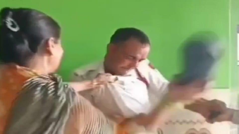 Woman hits traffic cop with 15 slippers Video of hotel owner goes viral