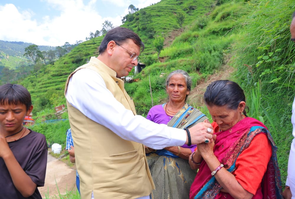 Pauri Disaster CM Dhami reached Sainji village wiped tears of affected people emotional Photos