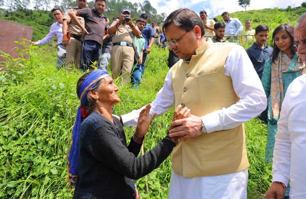 Pauri Disaster CM Dhami reached Sainji village wiped tears of affected people emotional Photos