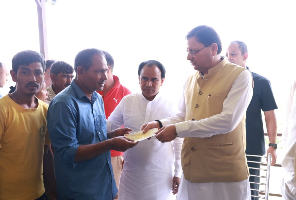 Pauri Disaster CM Dhami reached Sainji village wiped tears of affected people emotional Photos