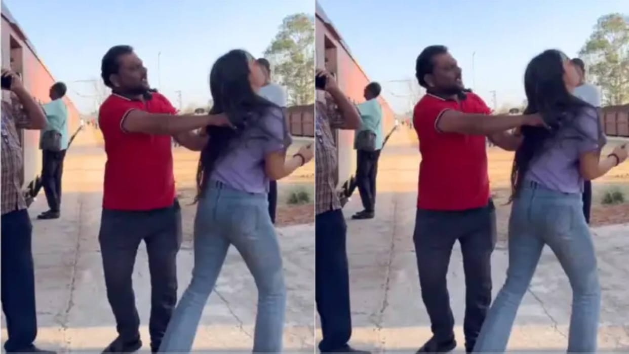 A girl was making a reel at the railway station suddenly a man came and pushed her Video goes Viral