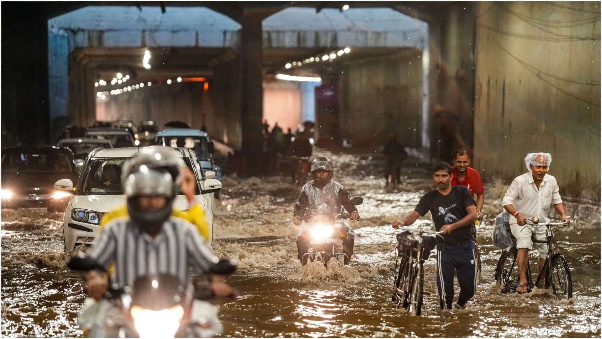 Heavy rain batters Delhi NCR on Raksha Bandhan waterlogging in many parts of city See Photos
