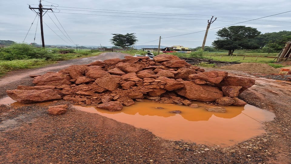 Rural road became dilapidated due to movement of bauxite trucks boulders were dropped in the name of repair in