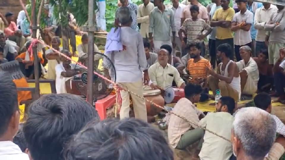 Bitten by snake six days ago hope of bringing his son back to life they doing exorcism