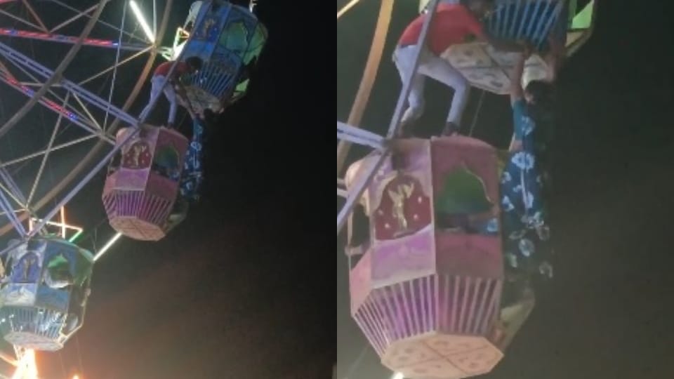 woman who slipped from the seat of the swing and was hanging outside was rescued safely