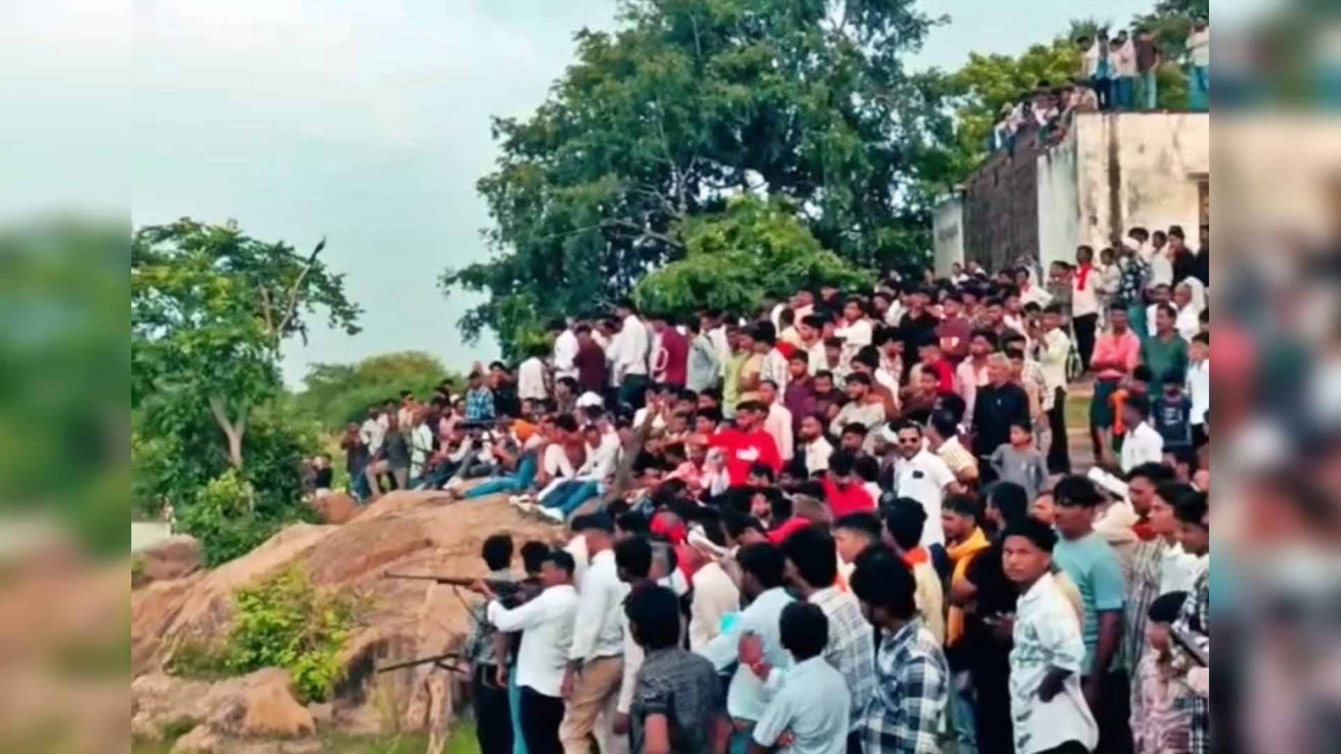 Gwalior News Illegal Firing Competition in Itayal Village Over 50 Riflemen Shoot at Pot in Pond Despite Ban