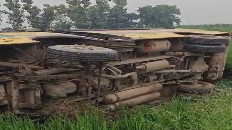 A high speed school bus lost control and overturned in Hapur children had a narrow escape