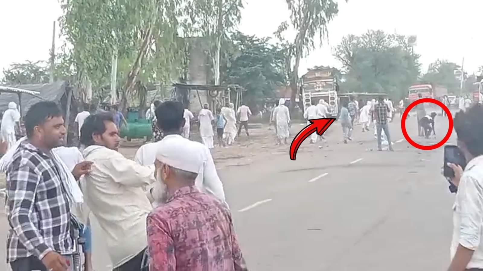 Nuh violence Fighting stone pelting and arson bikes and shops burnt bottles also thrown full story