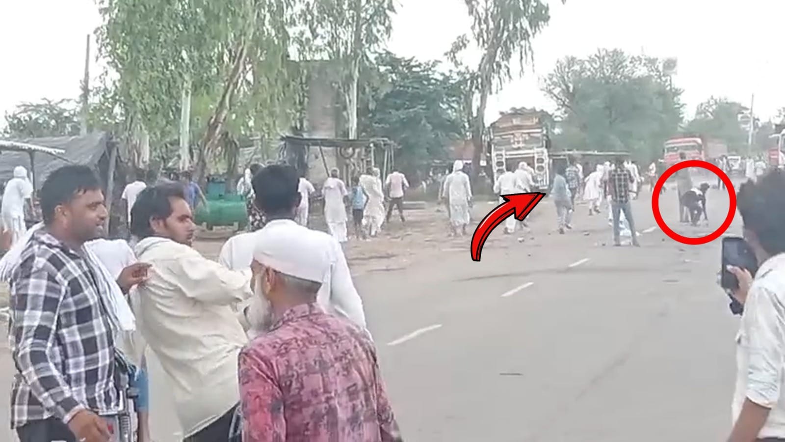 Nuh violence Fighting stone pelting and arson bikes and shops burnt bottles also thrown full story