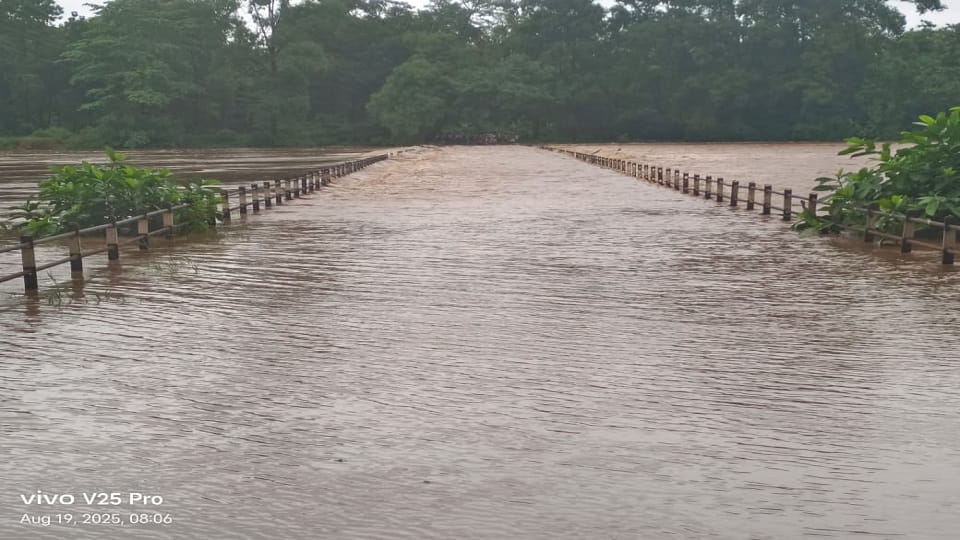 River water flowing over the bridge heavy rain warning contact with Orissa lost in Sukma