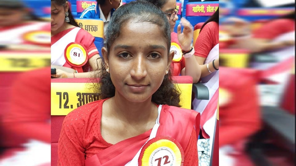 Asha chose music to fulfill her grandfather's dream and got three medals
