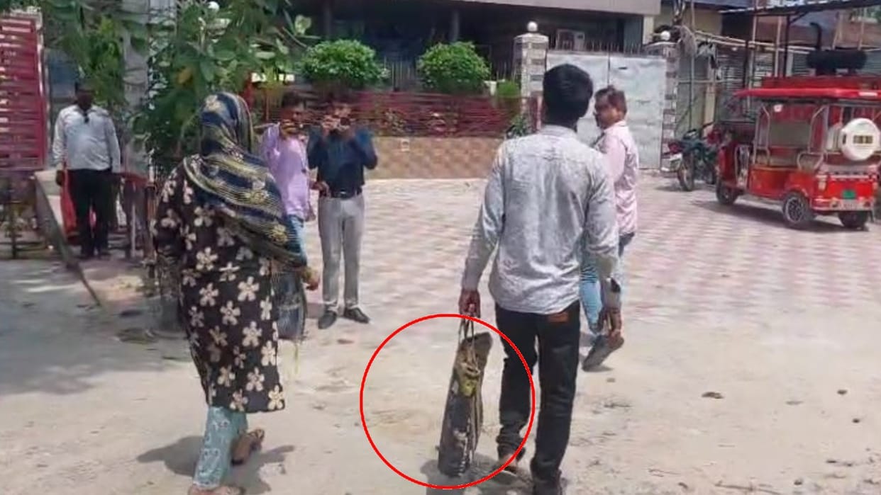 father reached the DM office with the dead body of the newborn baby in bag in lakhimpur kheri