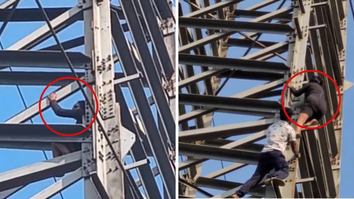Girl climbed 100 feet high electricity tower waiting for her boyfriend Video goes Viral on Internet