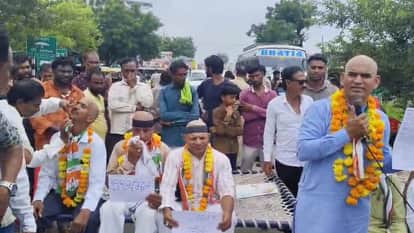 Congressmen angry with potholes blocked roads and got their heads shaved
