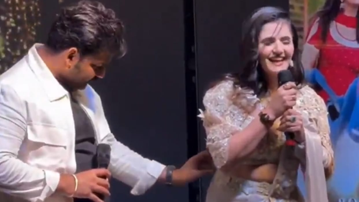 Pawan Singh Touch Anjali Raghav Waist In Viral Video Social Media Calls It Molestation