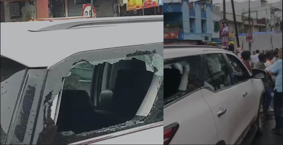 जीतू पटवारी के काफिले पर रविवार को रतलाम में हमला किया गया, गाड़ी के टूटे हुए शीशे।