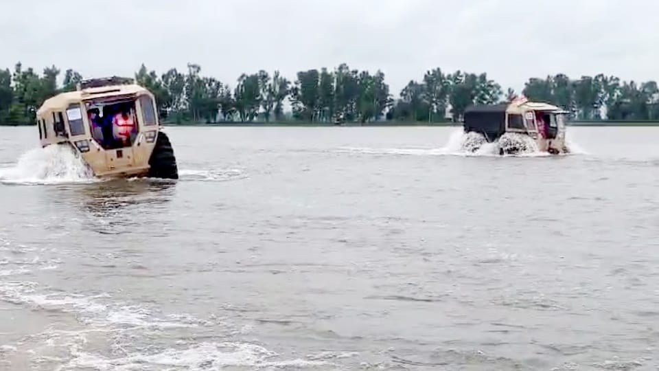 Jattan village submerged in water Four feet of water in houses people camping on roofs