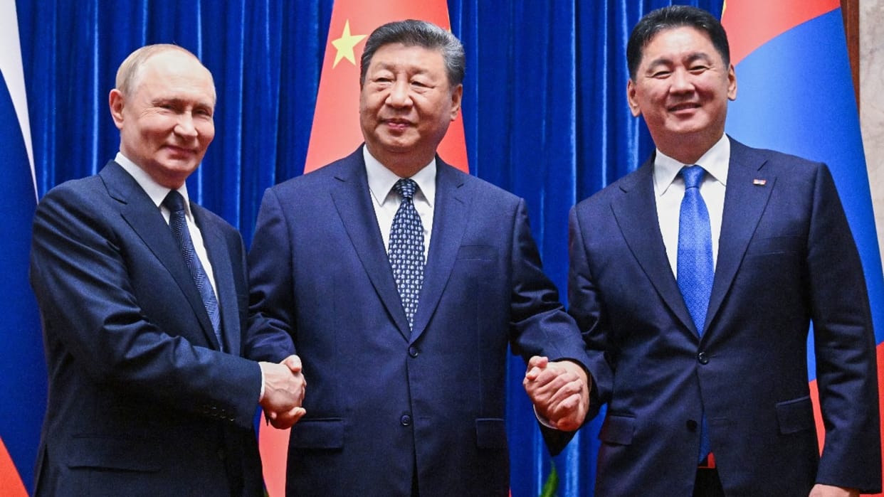 Xi, Putin reaffirm 'old friend' ties in face of US challenges
