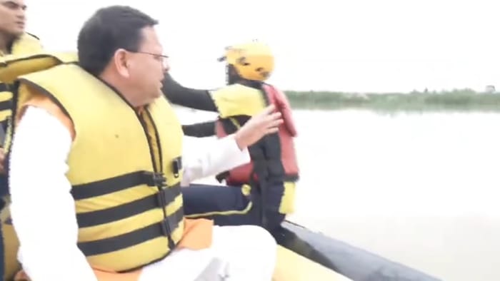 Haridwar News CM Dhami inspected disaster affected areas in Laksar sitting on a tractor In Roorkee